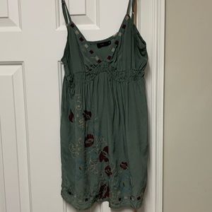Dark green tank top with red embroidery